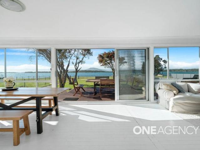 FURNISHED COASTAL RETREAT WITH WATER VIEWS