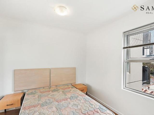 Furnished CBD Fringe Apartment with Elevated Views & Unbeatable Convenience