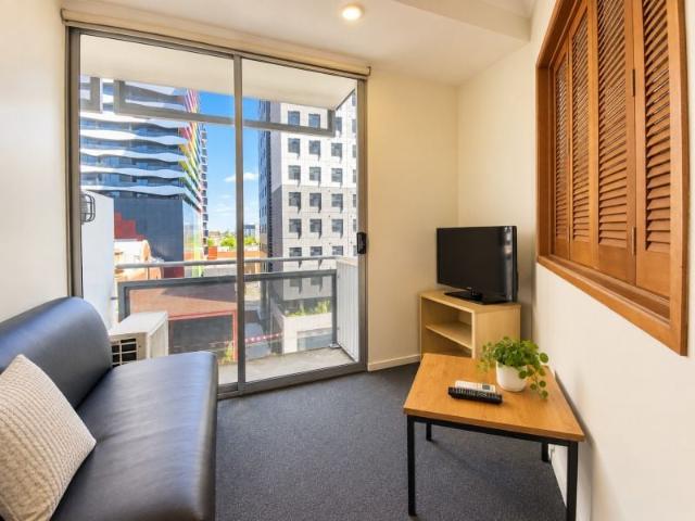 Furnished City Apartment with Balcony & Convenient Inner City Living