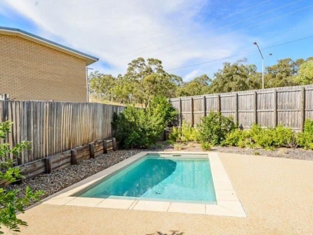 Furnished Air Conditioned Unit in Complex with a Pool!
