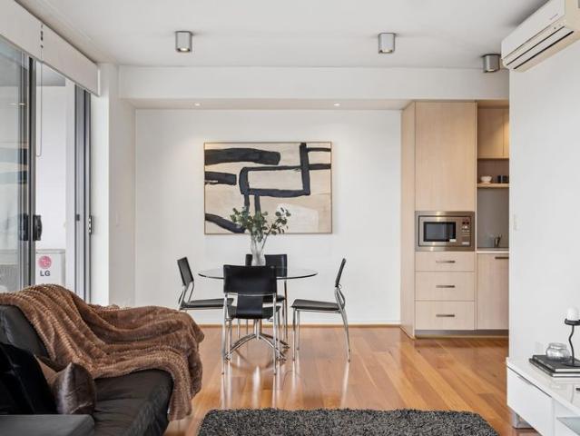 Furnished Apartment with Expansive Balcony and City Views