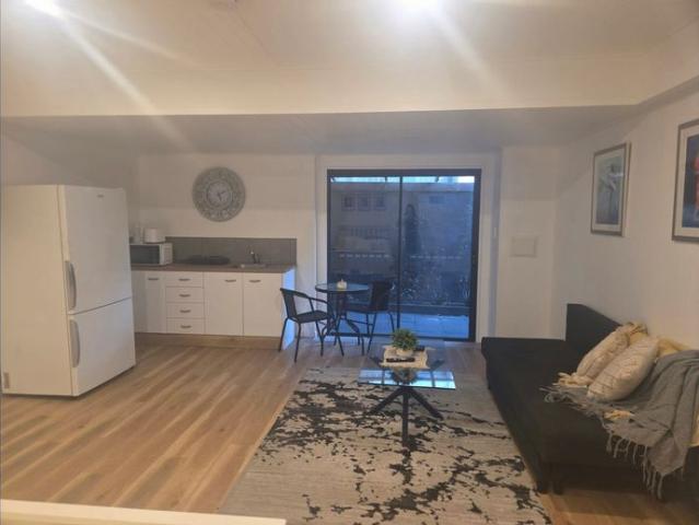 Furnished Beachside Studio Living with a Courtyard includes ALL SERVICES