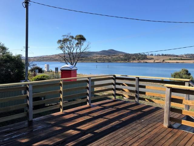 Furnished home on large block with water views