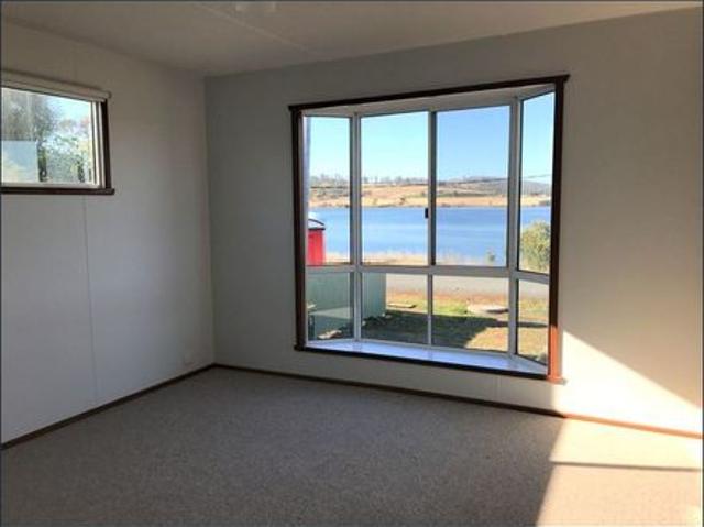 Furnished home on large block with water views