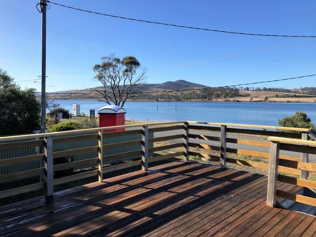Furnished home on large block with water views