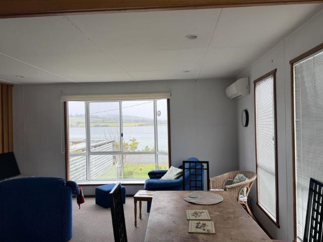 Furnished home on large block with water views