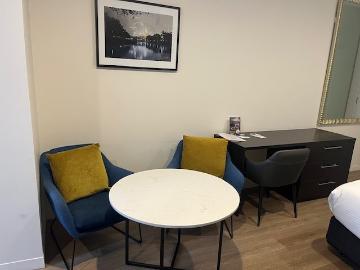 furnished studio apartment with balcony