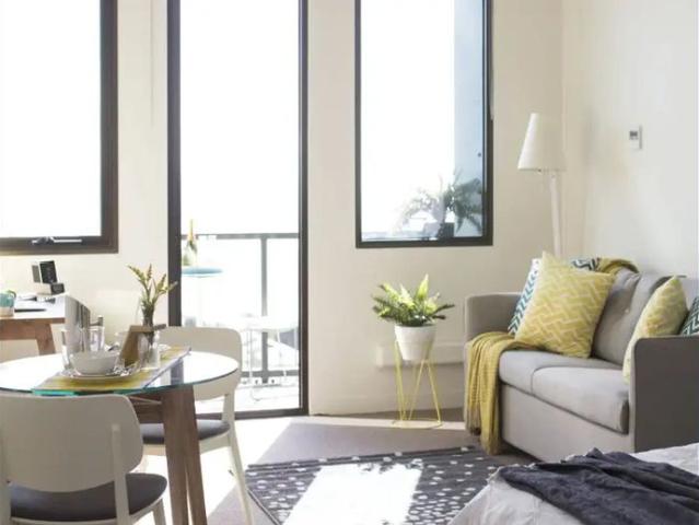 Furnished Studio Apartment Balcony with Sweeping Bay Views