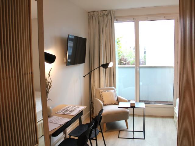Furnished studio with balcony, rooftop, garden, gym, home cinema, cleaning and maintenance services in a new residence