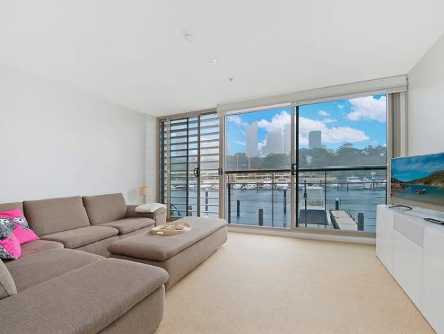 Furnished west facing apartment with water & city views