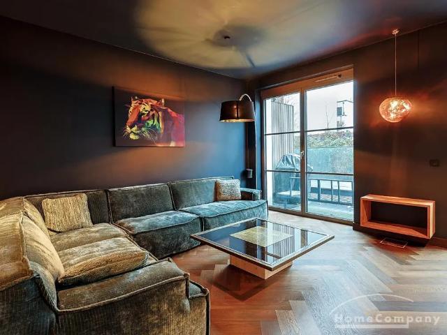 Furnished very nice business flat with 2 bedrooms, 3 bathrooms and garage Modern luxury directly on the canal