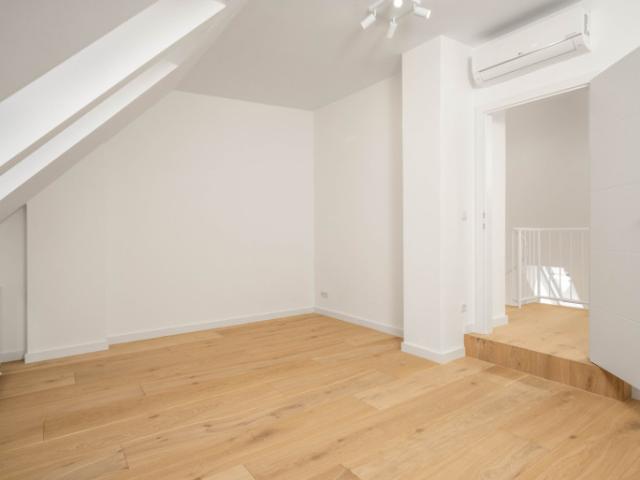 Galerie mit Wendeltreppe