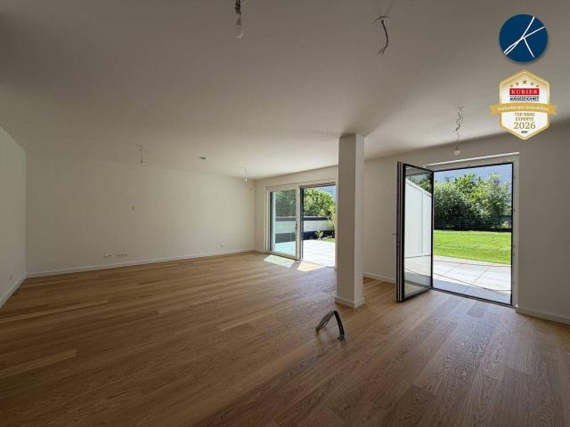 Gartenwohnung mit 260m² Außenbereichen Top 1 Erstbezug!