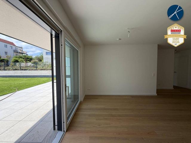 Gartenwohnung mit 343m² Außenbereichen Top 2 Erstbezug!