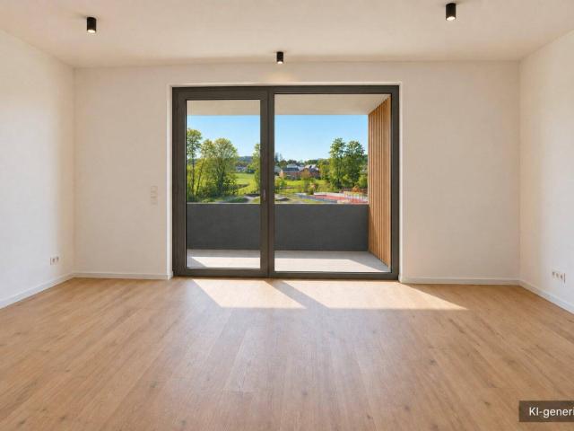 Gartenwohnung mit überdachtem Balkon – Erstbezug 2027