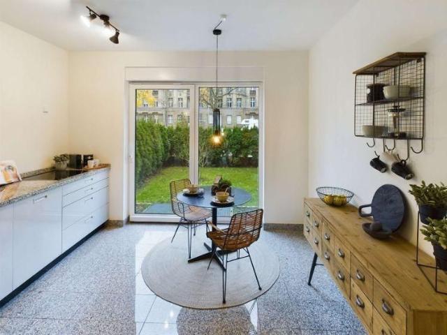 Gartenwohnung mit großzügiger Sonnenterrasse und privatem Gartenparadies