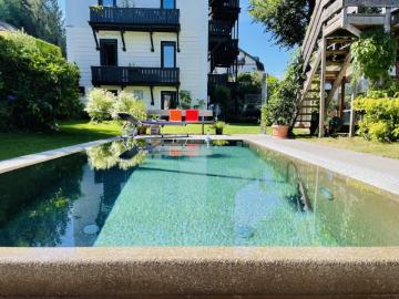 Gartenwohnung mit Pool in Innsbruck Igls – 653 m² Privatgarten & Top Lage