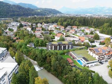 3 Zimmer Gartenwohnung mit ca. 121 m² Freiraum direkt am Kaiserbach