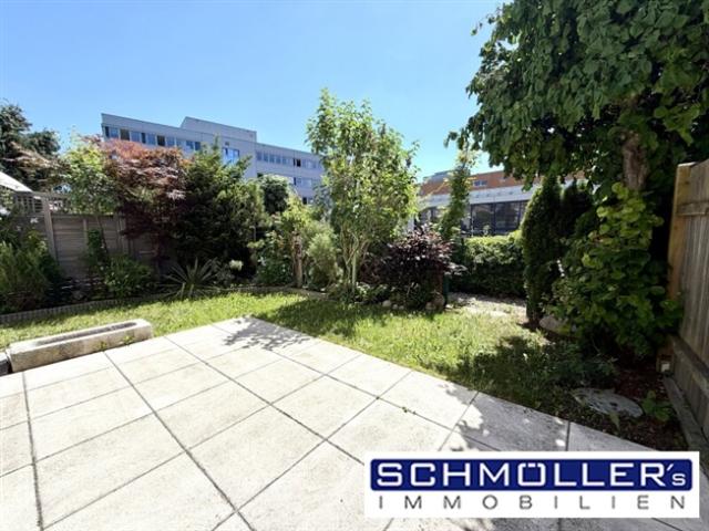 Garten Wohnung mit Hauscharakter in zentraler Lage