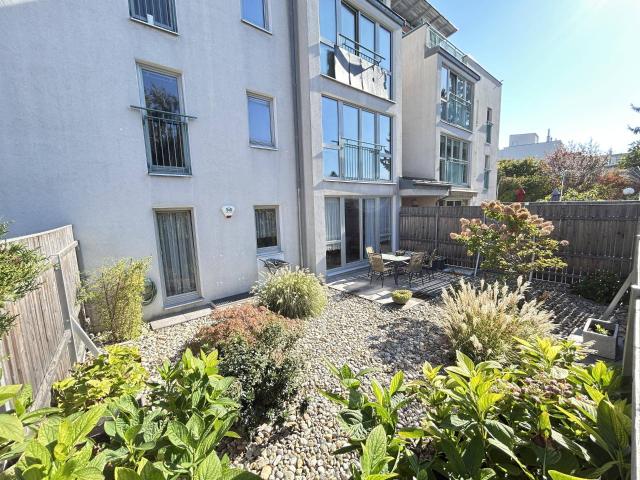 Gartenidylle in Stammersdorf – gepflegte 2 Zimmer Wohnung mit Wintergarten und sonnigem Eigengarten