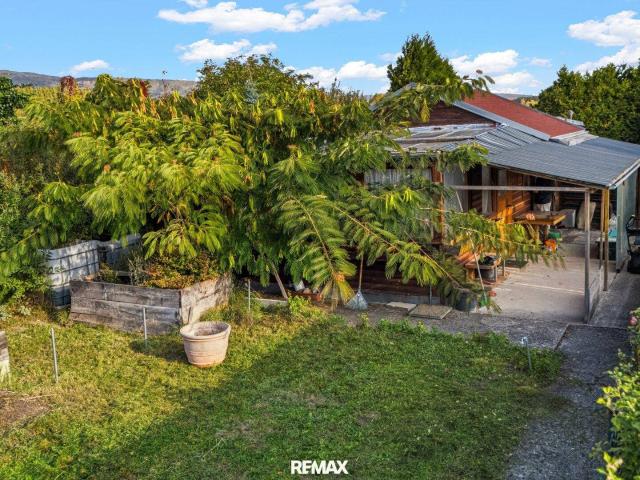 Gartenparadies am Wiener Neustädter Kanal – 612 m² mit Gartenhaus und Wintergarten!