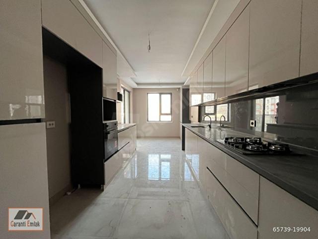 GARANTİ EMLAK FARKIYLA TERAS BALKONLU SIFIR FULL YAPILI LÜKS 4+1 DAİRE