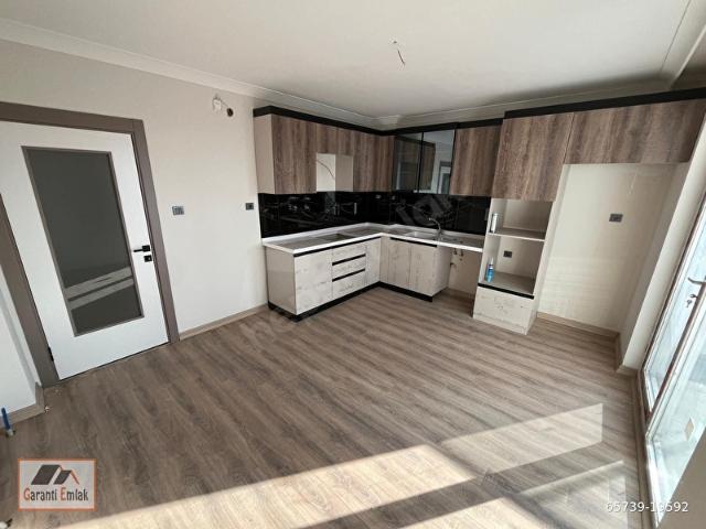 GARANTİ EMLAK'TAN CADDE KENARI TERAS BALKONLU 3+1 DAİRE