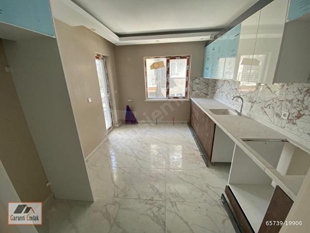 GARANTİ EMLAK'TAN SATILIK 3+1 SIFIR ARA KAT DAİRE
