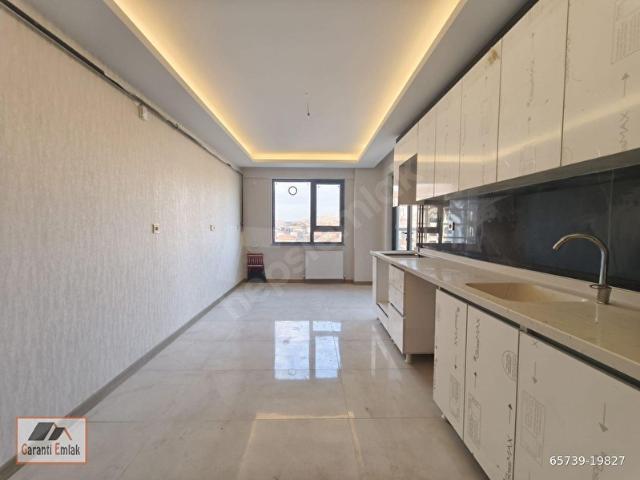GARANTİ EMLAK'TAN SATILIK 3+1 TERAS BALKONLU SIFIR SİTE DAİRESİ