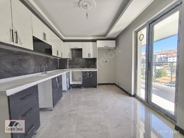 GARANTİ EMLAK'TAN SATILIK *CADDE ÜZERİ SIFIR* 3+1 ARA KAT DAİRE