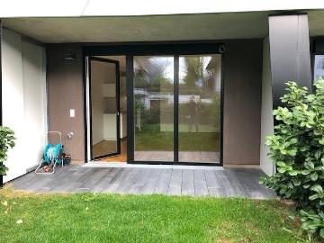 Garconniere Wohnstudio mit Terrasse, Garten und Tiefgaragenabstellplatz