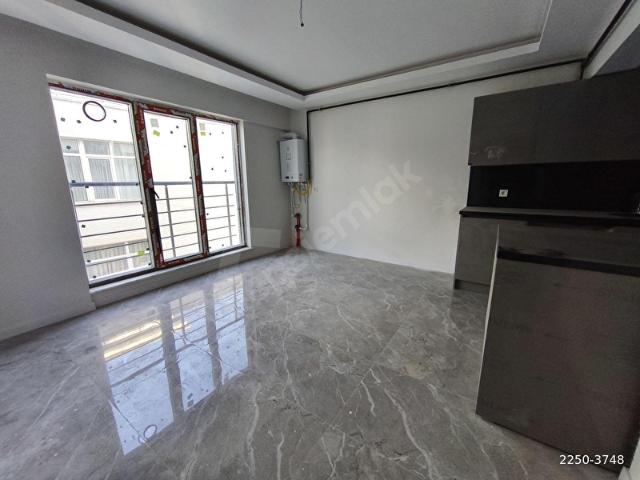 GARDEN'DEN sıfır binada katta full yapılı 1+1 satılık daire