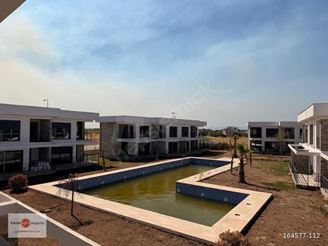 Gardenia Ayvalık'ta Havuz Cepheli Büyük Tip Satılık Villa