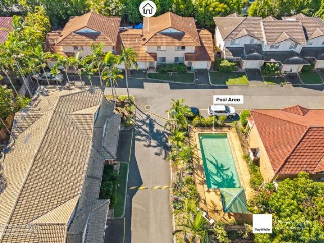 GATED COMPLEX WITH 2 POOLS