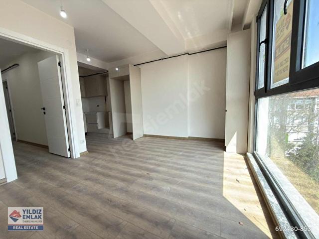 Gayrattepe'de deniz manzaralı 1+1 otoparklı satılık sıfır daire
