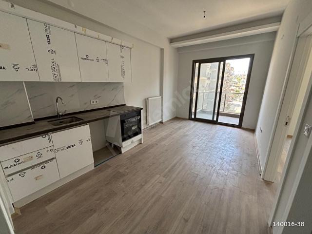 GAZİEMİR SİSTEM RESİDENC'DE ARAKAT 1+1 SATILIK DAİRE