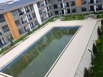 GAZİ EMLAKAkyol Lounge 1+1 HAVUZA BAKAN Daire Sıfır En üst