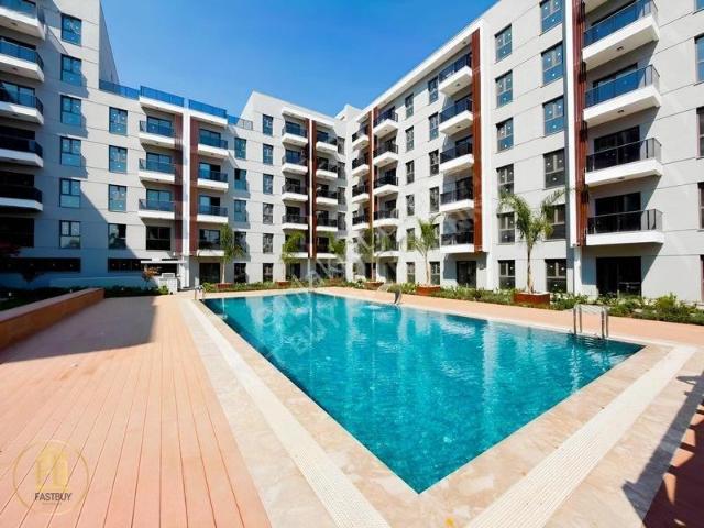 Gaziemir Sistem Yapı 1+1 Sıfır Eşyalı Kiralık Daire
