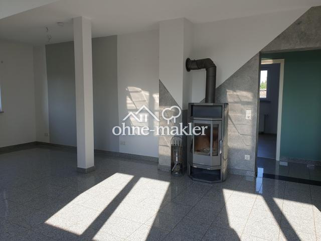 Gemütliche Dachgeschosswohnung mit sonniger Dachterrasse und Kaminofen sofort beziehbar