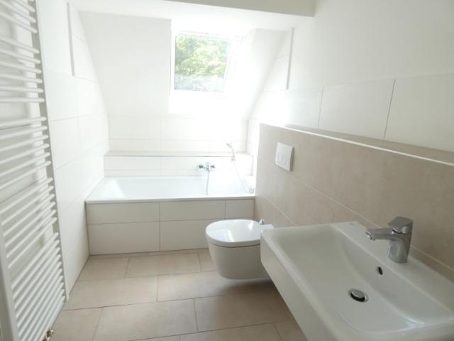 Gemütliche und moderne DG Wohnung mit Balkon und Dielenböden