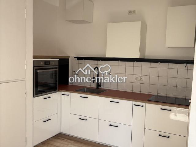 Gemütliche 2 Zimmer Wohnung mit moderner Wohnküche & weißem Wannenbad – ruhig zum Innenhof