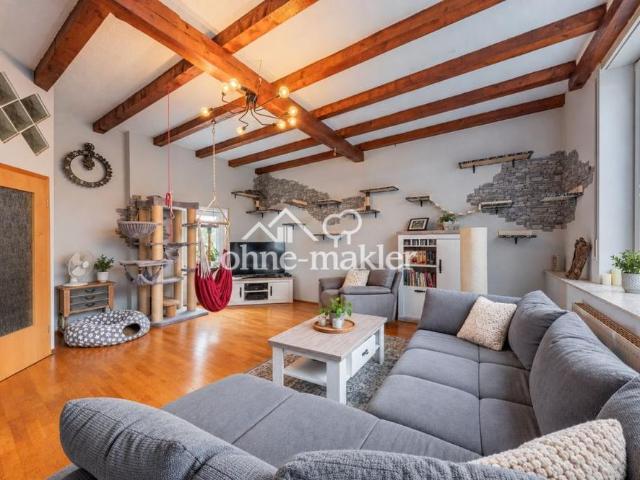 Gemütliche 3 Zimmer Wohnung mit eigenem Garten, Kaminofen, Terrasse und Balkon