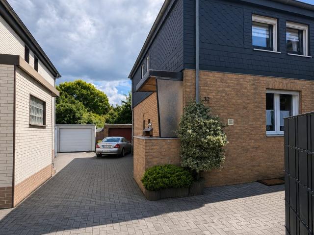 Gemütliches Reihenendhaus mit großem Garten, Terrasse, Garage und viel Nutzfläche
