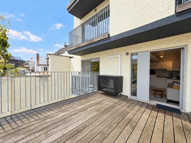 Gemeubeld appartement met ruim dakterras tussen UZ en Sin.