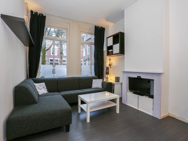 Gemeubileerde benedenwoning met tuin