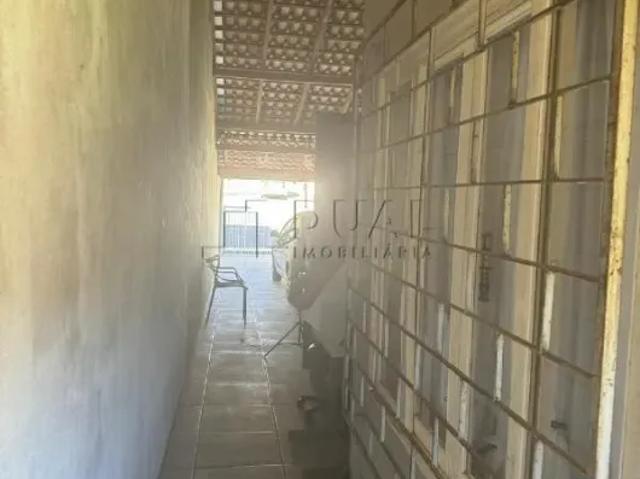 Geminado térreo em condomínio fechado Jardim das Flores no bairro Estrada Nova
