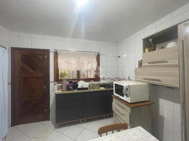 Geminado com 2 dormitórios localizado no Bairro Arroio Grande