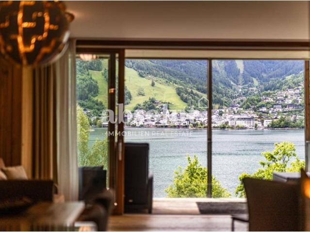 Genuss auf höchstem Niveau! Ferienwohnung mit 2 SZ und Panoramablick direkt am Ufer des Zeller Sees!