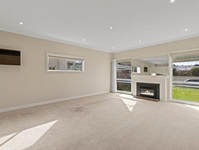 GENEROUS TWO BEDROOM, TWO LIVING HOME!