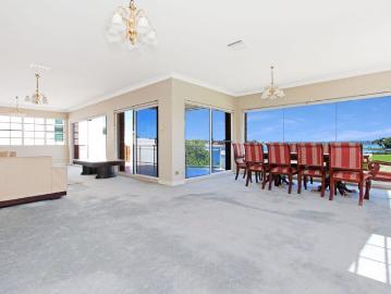 Generous Waterfront Home In Exclusive Locale